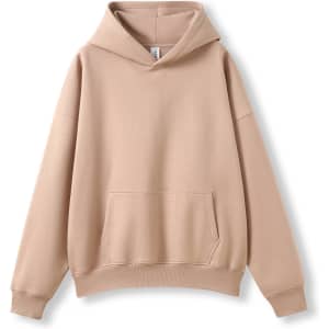 A beige adult's oversized hoodie with a front pocket and an attached hood, featuring a logo.