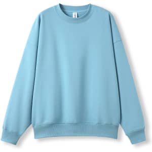 A light blue oversized crew neck fleece jumper with long sleeves and a relaxed fit. It features a logo.