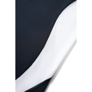A close-up of a men's polo shirt featuring a navy and white design, with visible stitching and texture.