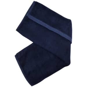 A navy bamboo hand towel with a textured stripe, folded neatly. Features a logo.