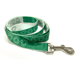 A green rPET dog leash featuring a recycling symbol pattern and a metal clip for attachment.