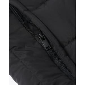 A black insulated puffer vest featuring a zippered pocket and a stitched texture. The vest has a logo.