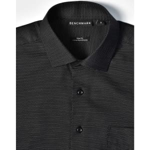 A black pin dot stretch short-sleeve button-up shirt featuring a collar, buttons, and a pocket. It includes branding on the collar.