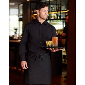 A man in a black shirt is holding a tray with drinks while wearing a black short waist apron.