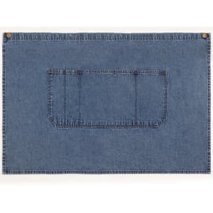 A denim half apron in blue with a front pocket and brass button accents. It has a simple, functional design.