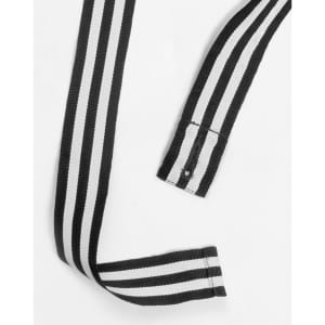Two-tone apron straps in black and white, featuring alternating stripes and a looped end for attachment.