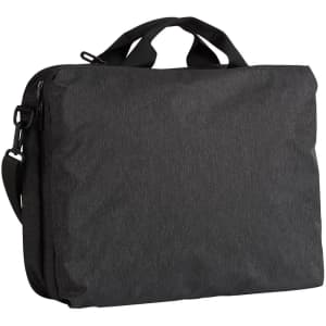A grey laptop bag with dual handles, a detachable strap, and a subtle branding detail.