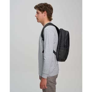 A black Elite PU backpack is shown worn on the back of a person in a grey long-sleeve shirt.