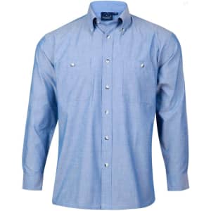 A long sleeve button-up shirt in light blue chambray, featuring two chest pockets and a logo on the collar.