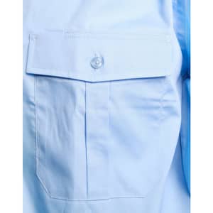 A light blue button-up shirt featuring an epaulette and a single front pocket with a button closure.