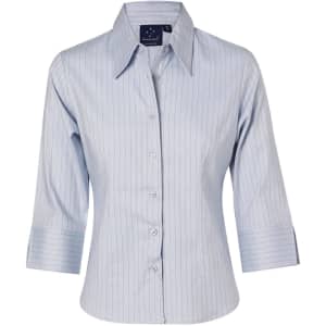 A light blue, long sleeve, button-up shirt with vertical stripes and a logo on the collar.