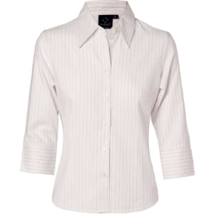 A ladies' pinstripe long sleeve shirt in cream, featuring a button-up front and a collar. The shirt has a logo.