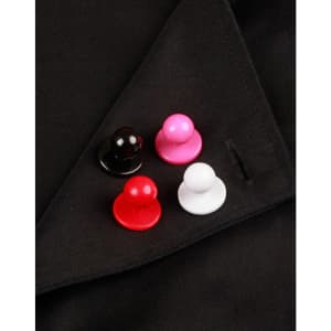 Four exchangeable buttons in black, red, pink, and white displayed on a black chef's uniform.