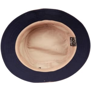 A navy blue bucket hat with a light-coloured interior, featuring a branding label inside.