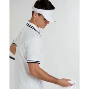 A white visor with a contrasting band and a logo, worn by a person in a white polo shirt.