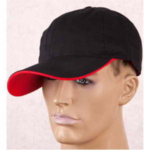 A black cap with a red contrast colour on the peak, featuring a logo on the front.
