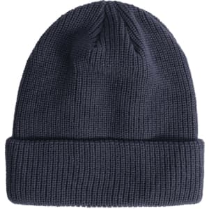 A navy roll-up cable knit snug beanie with a folded brim and a logo.