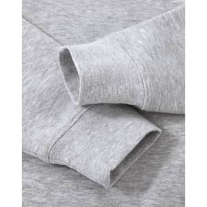 A grey crew fleece sweater featuring long sleeve cuffs and a soft texture, with a logo present.