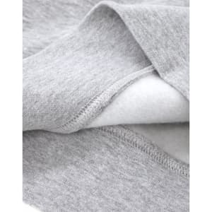A close-up of a grey crew fleece sweatshirt showing the soft interior fabric and detailed stitching.