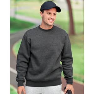 A dark grey crew neck fleece sweatshirt with a relaxed fit, worn by a man outdoors, paired with a cap.