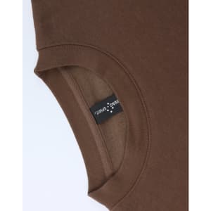 A brown crew fleece jumper with a round neckline, featuring an inner label and a smooth texture.