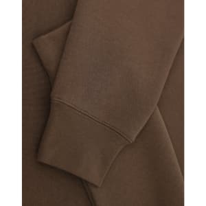 A brown crew fleece jumper with visible cuffs and fabric texture detail. Features a logo.