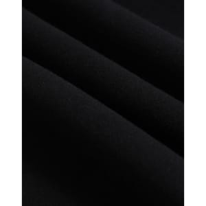 A close-up of black polar fleece fabric, showcasing its soft texture and layering. The image features a logo.