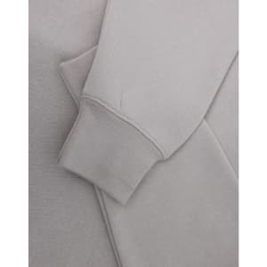 A light grey polar fleece jumper featuring a half zip collar and fitted cuffs. It has a subtle logo.