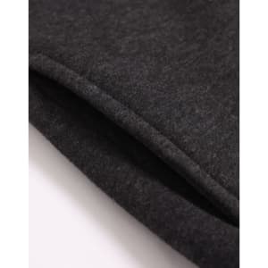 A close-up of a dark grey 1/2 zip collar fleecy jumper, showing the soft texture and stitching details.