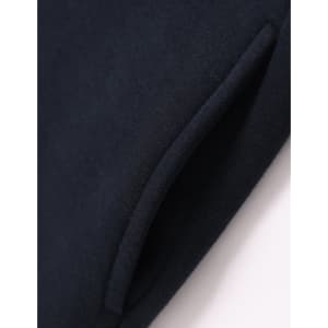 A close-up of a navy fleecy jumper featuring a half-zip collar and pockets. The fabric appears soft and textured.