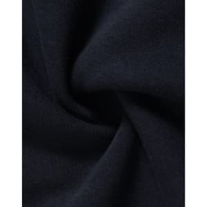 A close-up of navy fleece fabric showcasing its soft texture and smooth finish. The fabric has a subtle sheen.