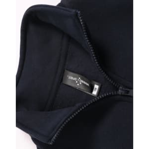 A navy 1/2 zip collar fleecy sweat with a smooth interior and a tag, featuring a logo.