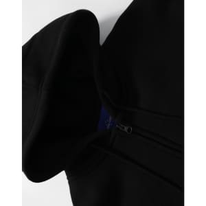 A black men's full-zip fleecy hoodie featuring a hood and a zipper, with a logo visible on the inside.