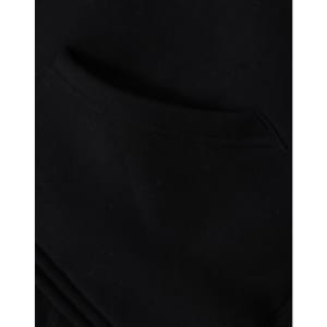 A close-up view of a black men's full-zip fleecy hoodie featuring a front pocket and a soft texture.