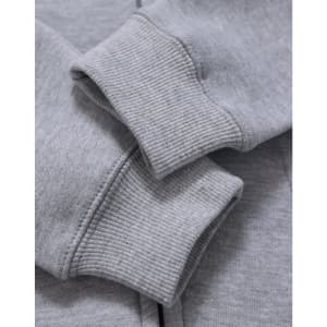 A grey full-zip fleecy hoodie featuring ribbed cuffs, highlighting texture and fabric detail. It has a logo.
