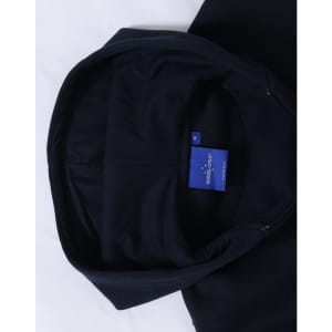 A navy full-zip fleecy hoodie featuring a hood and a branded label inside.