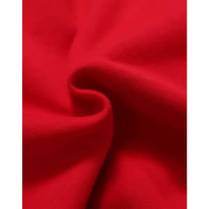 A close-up view of soft, red fleece fabric showing its textured surface. The image features a subtle fold in the material.
