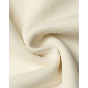 A close-up of soft, cream-coloured fabric showcasing a smooth texture and knit pattern.