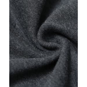 A close-up of dark grey fabric showcasing a soft, fleecy texture with a slight swirl pattern.