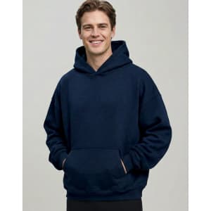A man wearing a navy unisex premium fleece oversized hoodie with a front pocket and a hood.
