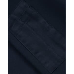 A close-up of a navy fleece fabric with a textured patch, featuring an area for branding or labels.