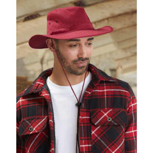 A maroon slouch hat featuring a break-away clip, paired with a red and black plaid jacket.