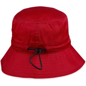 A red bucket hat with a toggle adjustment and a wide brim. The hat features a simple design and has a logo.