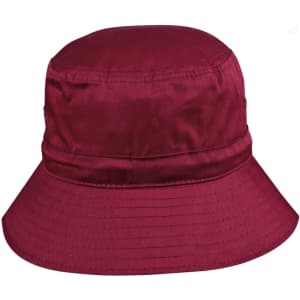 A maroon bucket hat with a wide brim and a toggle fastening, featuring a logo on the side.
