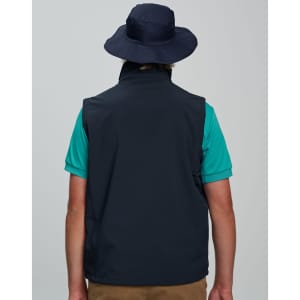 A navy blue surf hat with a clip-on chin strap, worn by a person from the back, paired with a teal shirt.