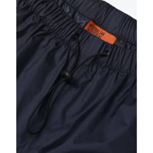 Lightweight nylon waterproof rain pants in navy blue, featuring an elastic waistband and drawstring for adjustment.