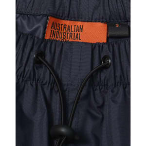 Navy lightweight nylon waterproof rain pants with an adjustable drawstring waistband and branding label.