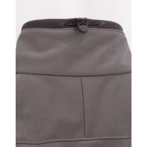 A grey ladies softshell hi-tech jacket featuring a high collar and adjustable cord at the neckline.