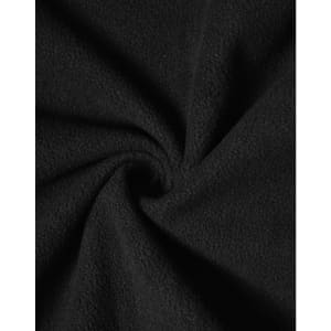 A close-up of soft black fabric showcasing a plush texture, suitable for high-tech softshell jackets.
