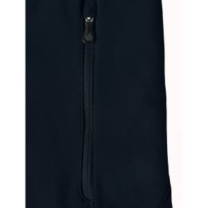A dark navy softshell jacket featuring a zippered pocket and a sleek design. The jacket also has a logo.